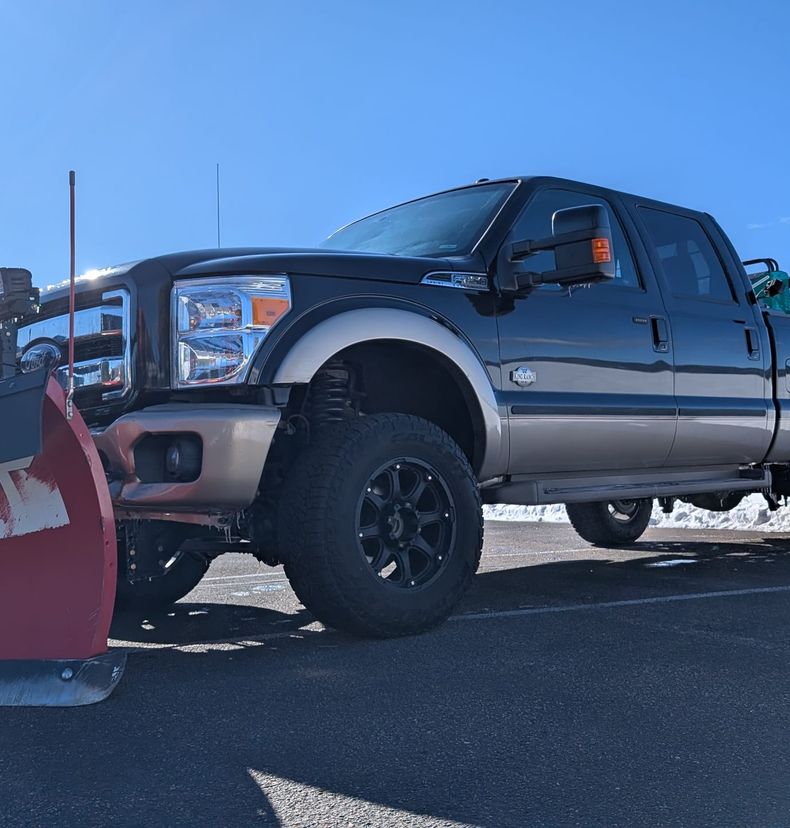 Red Beard's pickup with the plow blade lowered